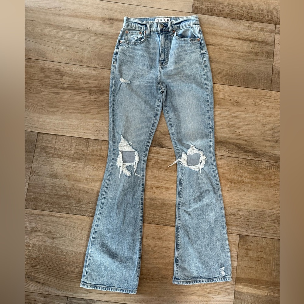 Blue Flare Wide Leg Jeans with Distressed Details